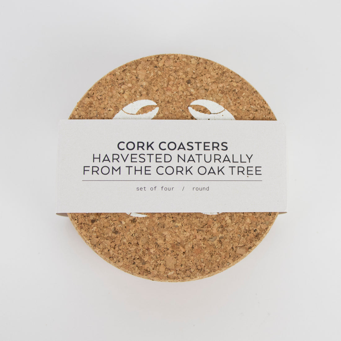 Natural cork coaster with crab design wrapped in eco band