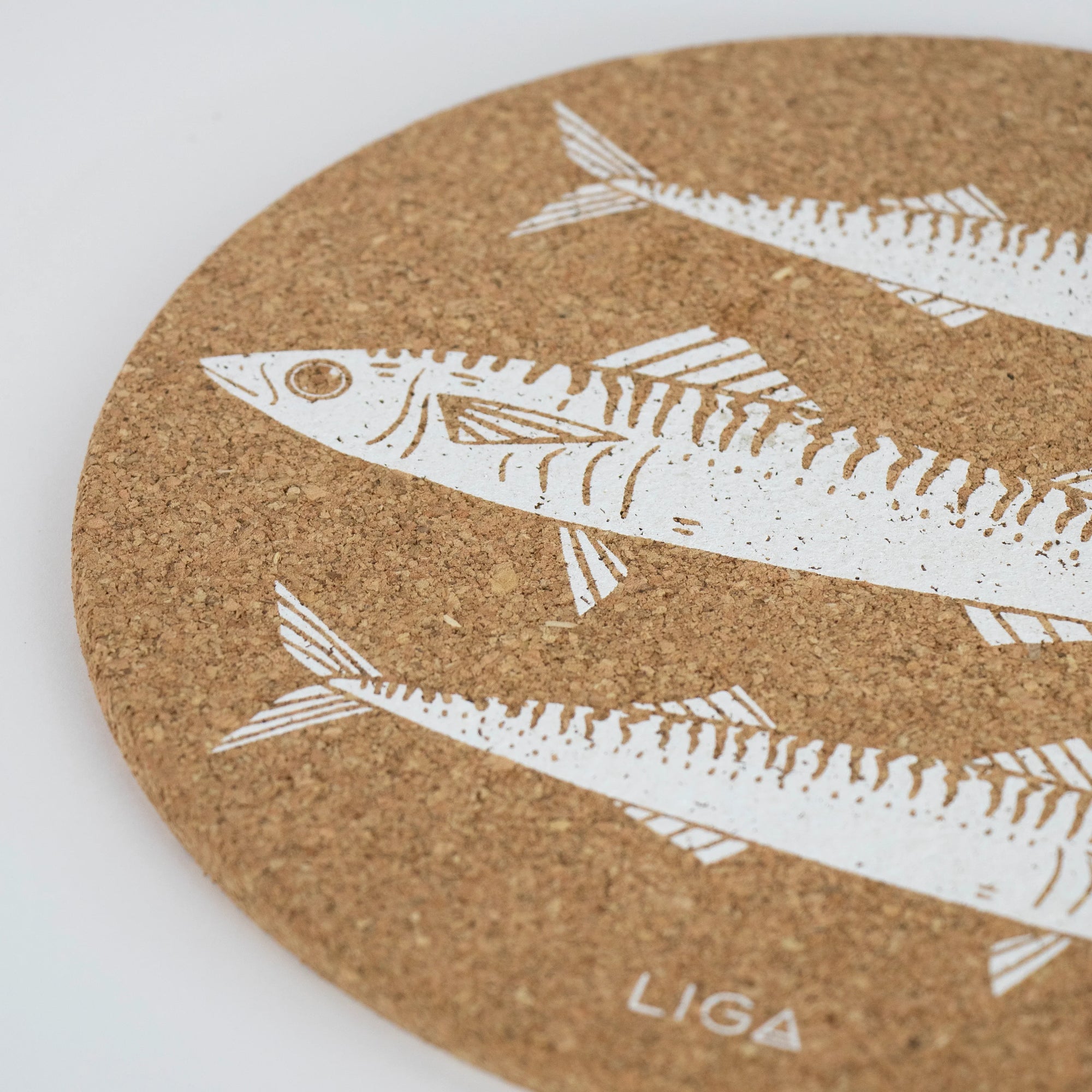 Sustainable cork placemat and coaster. Mackerel design